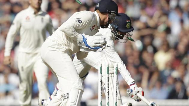 England's Jonny Bairstow runs out India's Jasprit Bumrah during the fifth cricket test match. (AP)