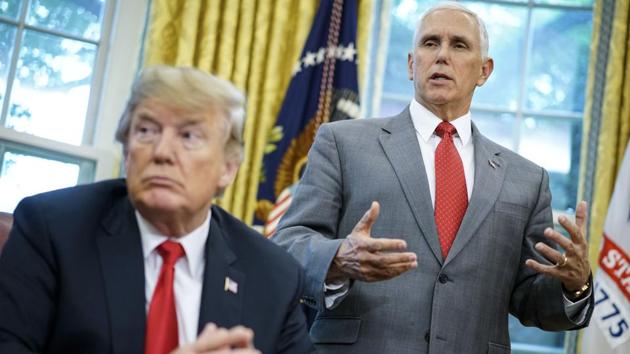 US vice president Mike Pence and president Donald Trump at the White House in Washington, DC. Mike Pence says he’s “100 percent confident” that no one on his staff was involved with the anonymous New York Times column criticizing president Donald Trump’s leadership. (AFP File Photo) US vice president Mike Pence and president Donald Trump at the White House in Washington, DC. Mike Pence says he’s “100 percent confident” that no one on his staff was involved with the anonymous New York Times column criticizing president Donald Trump’s leadership. (AFP File Photo)