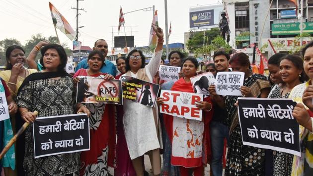 Congress party activist hold placards and shout slogans during protest against the abduction and gang-rape of five charity workers in Chochang village of Khunti district, in Ranchi on June 23, 2018. (Representative Image)(AFP File Photo)