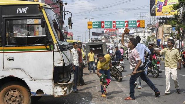 Jan Adhikar Party supporters vandalise vehicles during a protest in Patna. Six political parties in the state including the Rashtriya Janata Dal (RJD), have extended their support to the Bandh called by the Congress. Meanwhile, the Trinamool Congress in West Bengal has backed the protest, but ruled out its participation in the shutdown. (PTI) Jan Adhikar Party supporters vandalise vehicles during a protest in Patna. Six political parties in the state including the Rashtriya Janata Dal (RJD), have extended their support to the Bandh called by the Congress. Meanwhile, the Trinamool Congress in West Bengal has backed the protest, but ruled out its participation in the shutdown. (PTI)