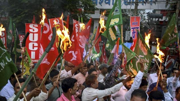 Leaders of several opposition parties hold a torchlight procession during a protest against the fuel price hike ahead of Bharat Bandh, in Ranchi, Sunday, Sept 09, 2018. (PTI) Leaders of several opposition parties hold a torchlight procession during a protest against the fuel price hike ahead of Bharat Bandh, in Ranchi, Sunday, Sept 09, 2018. (PTI)