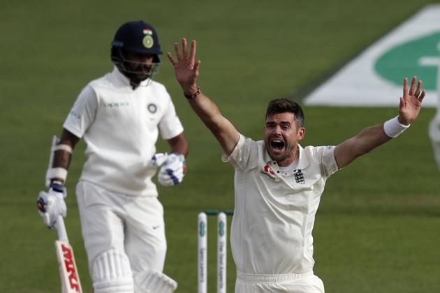 England's James Anderson celebrates after taking the wicket of India's Shikhar Dhawan. (AFP)