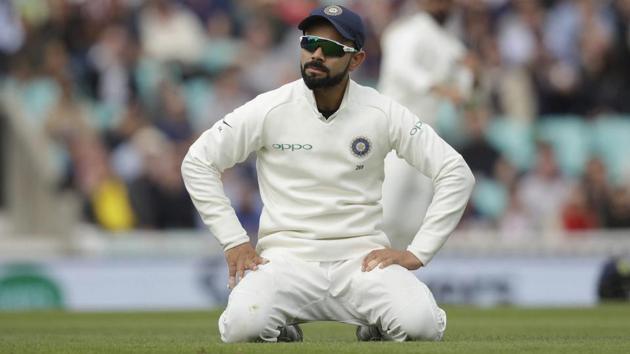 Virat Kohli kneels after fielding during the fifth cricket test match between India and England at the Oval. (AP) Virat Kohli kneels after fielding during the fifth cricket test match between India and England at the Oval. (AP)