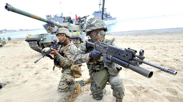 South Korean marines on the seashore in Pohang, 270-kms southeast of Seoul. Twelve inventive South Korean college students deliberately made themselves overweight to dodge mandatory military service, a branch of the armed forces in Seoul said Tuesday.(Representative Image/)