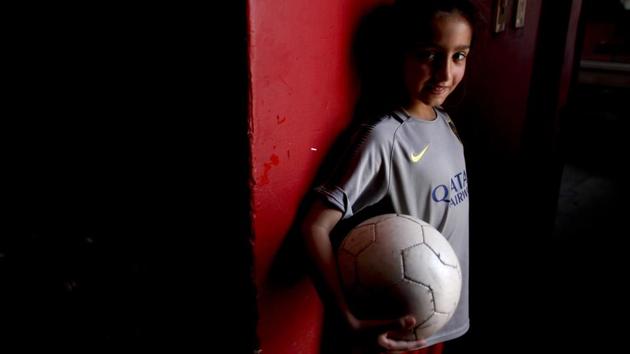 Candelaria Cabrera poses for a portrait in Chabaz. A regional regulation that prohibits mixed-gender teams in children’s categories now threatens to take her off the field — a ruling that has helped dramatize the inequality in opportunities for men and women in this football-crazed country. (Natacha Pisarenko / AP) Candelaria Cabrera poses for a portrait in Chabaz. A regional regulation that prohibits mixed-gender teams in children’s categories now threatens to take her off the field — a ruling that has helped dramatize the inequality in opportunities for men and women in this football-crazed country. (Natacha Pisarenko / AP)