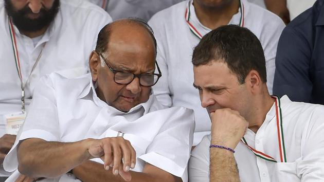 Congress President Rahul Gandhi (R) and NCP Chief Sharad Pawar during 'Bharat Bandh' protest called by Congress and other parties against fuel price hike and depreciation of the rupee, in New Delhi on Monday, Sept 10(PTI)