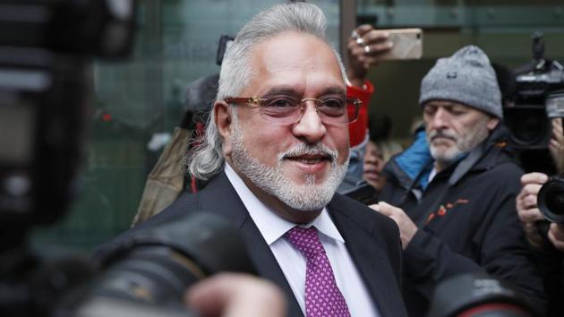 A defiant Vijay Mallya, who is facing money laundering charges in multi-crore fraud case said that he had made a “comprehensive settlement” offer before the Karnataka High Court that will help in paying off all his dues. The remarks by Mallya came as he arrived at the Westminster Magistrates’ Court for a hearing in his extradition case. (Alastair Grant / AP) A defiant Vijay Mallya, who is facing money laundering charges in multi-crore fraud case said that he had made a “comprehensive settlement” offer before the Karnataka High Court that will help in paying off all his dues. The remarks by Mallya came as he arrived at the Westminster Magistrates’ Court for a hearing in his extradition case. (Alastair Grant / AP)