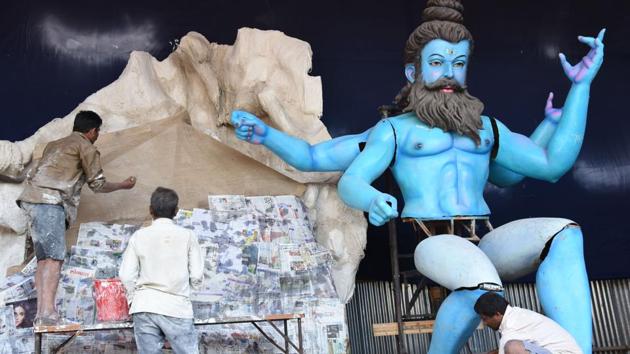 Work is on in full swing in Bhosari, on Thursday, as the stage is being set, ahead of Ganeshotsav. (HT PHOTO) 