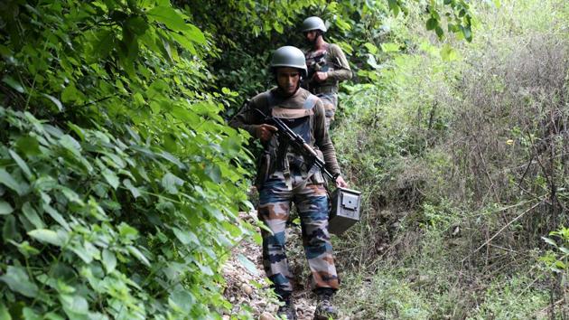 Army soldiers during a cordon and search operation after suspected militants who were travelling in a truck, opened fire near a security check point on the Jammu-Srinagar highway on Wednesday. The police seized one AK-47 rifle and three magazines from the intercepted truck and the driver and conductor have been taken into custody. (Nitin Kanotra / HT Photo) Army soldiers during a cordon and search operation after suspected militants who were travelling in a truck, opened fire near a security check point on the Jammu-Srinagar highway on Wednesday. The police seized one AK-47 rifle and three magazines from the intercepted truck and the driver and conductor have been taken into custody. (Nitin Kanotra / HT Photo)