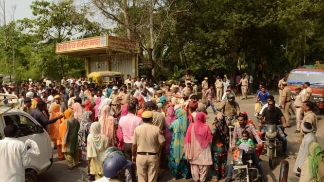 Family members of the deceased held a protest at Ranwar village in Karnal district and blocked a road, demanding arrest of the assailants at the earliest. (HT Photo) Family members of the deceased held a protest at Ranwar village in Karnal district and blocked a road, demanding arrest of the assailants at the earliest. (HT Photo)
