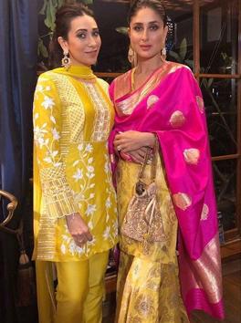 Sisters Karisma and Kareena Kapoor looked stunning in traditional attire for Ganesh Chathurti. Sisters Karisma and Kareena Kapoor looked stunning in traditional attire for Ganesh Chathurti.