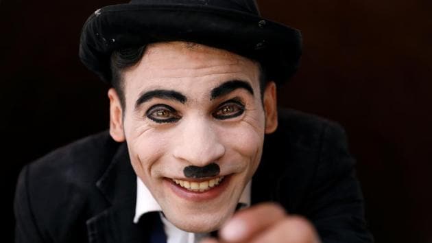 “It is very simple, I want to give Afghans a reason to smile,” said Karim Asir, a stand-up comedian who performs across the capital Kabul in Chaplin’s trademark oversized shoes, baggy pants, cane and black bowler hat. (Mohammad Ismail / REUTERS) “It is very simple, I want to give Afghans a reason to smile,” said Karim Asir, a stand-up comedian who performs across the capital Kabul in Chaplin’s trademark oversized shoes, baggy pants, cane and black bowler hat. (Mohammad Ismail / REUTERS)