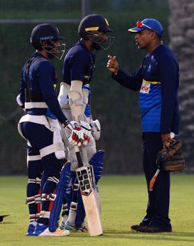 Sri Lankan batting coach Thilan Samaraweera (R) speaks with Upul Tharanga (C) and Kusal Mendis during a training session at the Dubai Sports city in Dubai. (AFP) Sri Lankan batting coach Thilan Samaraweera (R) speaks with Upul Tharanga (C) and Kusal Mendis during a training session at the Dubai Sports city in Dubai. (AFP)