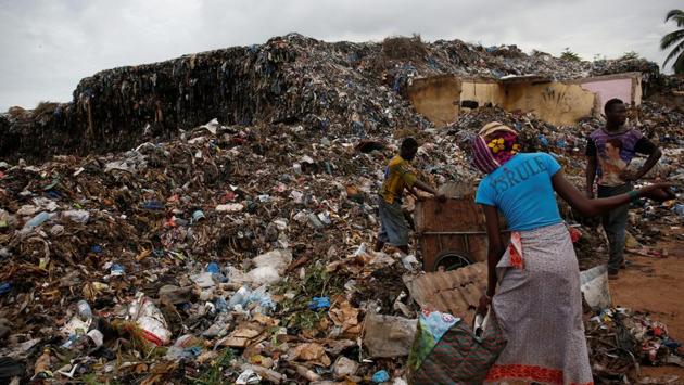 People search through trash at a dump in Bamako. Mali is one of the poorest countries in the world and the authorities struggle to provide adequate public services in the capital. (Luc Gnago / REUTERS) 