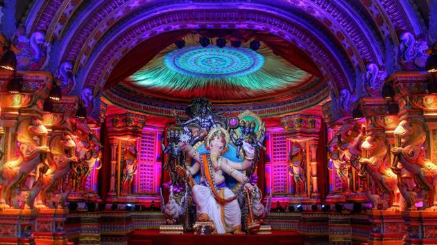 A view of a pandal at Chinchpokli in Mumbai. Several beautifully decked up pandals have been erected in all major cities and towns in the state, including Mumbai, Pune, Nashik and Nagpur, where huge idols of Lord Ganesha have been placed on raised platforms for people to worship. (PTI) A view of a pandal at Chinchpokli in Mumbai. Several beautifully decked up pandals have been erected in all major cities and towns in the state, including Mumbai, Pune, Nashik and Nagpur, where huge idols of Lord Ganesha have been placed on raised platforms for people to worship. (PTI)