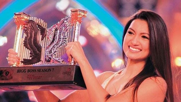 Bigg Boss past winner Gauahar Khan with her winning trophy. She is modelling for different assignments these days.