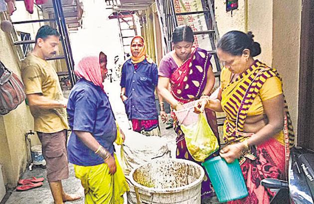Swach waste pickers collecting waste door-to-door and then segregating it, at Shivtirth nagar, ward 11, Kothrud. (HT PHOTO) Swach waste pickers collecting waste door-to-door and then segregating it, at Shivtirth nagar, ward 11, Kothrud. (HT PHOTO)