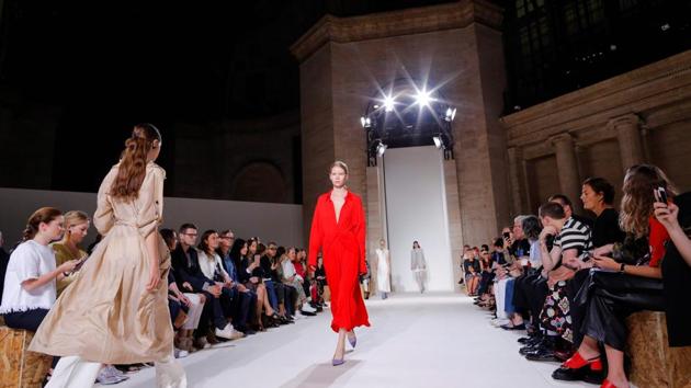 In this file photo taken on September 10, 2017, models walk the runway for the Victoria Beckham SS18 show during New York Fashion Week in New York. London Fashion Week opens on September 14, 2018, with all eyes on Victoria Beckham, who debuts at the event on the 10th anniversary of her label's launch.(AFP)