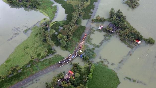An aerial view shows partially submerged road at a flooded area in the southern state of Kerala. (REUTERS) An aerial view shows partially submerged road at a flooded area in the southern state of Kerala. (REUTERS)