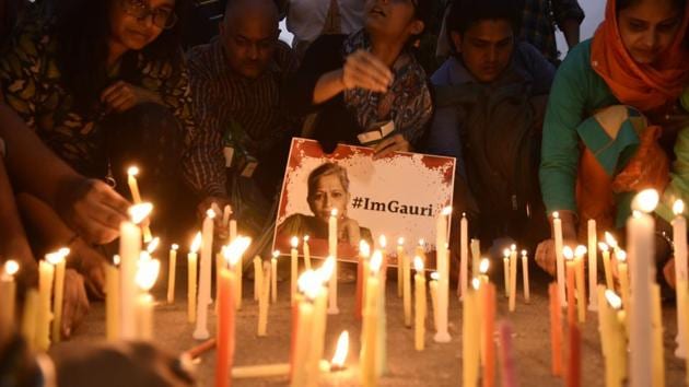 A candlelight vigil organised after the murder of journalist Gauri Lankesh, in New Delhi.(Burhaan Kinu/HT File Photo)