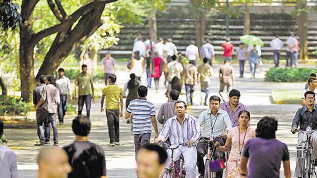 Infosys Technologies employees move through the headquarters during a break in Bangalore, India. (AP Representative Photo) Infosys Technologies employees move through the headquarters during a break in Bangalore, India. (AP Representative Photo)