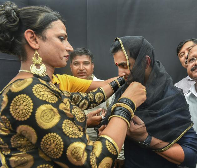 Cricketer Gautam Gambhir wears a bindi and dupatta as transgenders honour him at the seventh Hijra Habba in Delhi. (Arun Sharma/PTI) Cricketer Gautam Gambhir wears a bindi and dupatta as transgenders honour him at the seventh Hijra Habba in Delhi. (Arun Sharma/PTI)