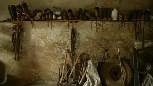 Work utensils are stored inside a room, to be used by workers. Amid changing lifestyles and competition from industrially produced charcoal, these days it’s only restaurants and private households that buy the few tons of fuel Lander produces every year according to centuries-old tradition. The future, as he sees it, is far away from the slow-burning, smoking firewood pyres. (Alvaro Barrientos / AP) Work utensils are stored inside a room, to be used by workers. Amid changing lifestyles and competition from industrially produced charcoal, these days it’s only restaurants and private households that buy the few tons of fuel Lander produces every year according to centuries-old tradition. The future, as he sees it, is far away from the slow-burning, smoking firewood pyres. (Alvaro Barrientos / AP)