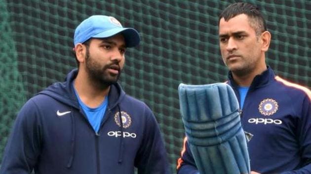 File image of Rohit Sharma (L) and MS Dhoni. (PTI) File image of Rohit Sharma (L) and MS Dhoni. (PTI)