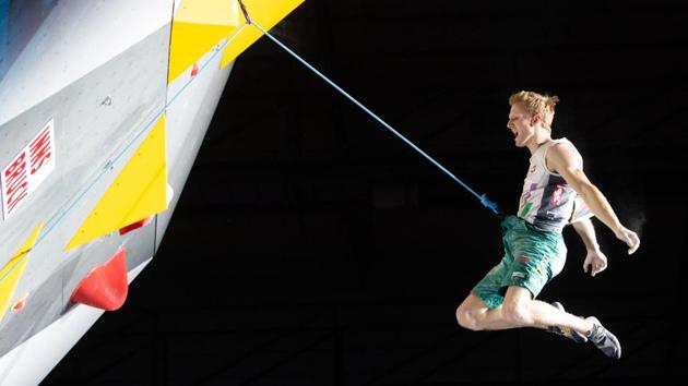 Jakob Schubert of Austria reacts during the Final of the Men Lead competition at the IFSC Climbing World Championships in Innsbruck, Austria. (Johann GRODER / various sources / AFP)