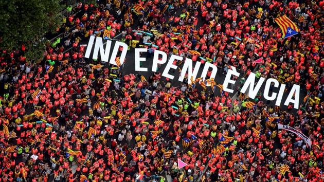 An aerial view of people holding letters reading "Independence" during a pro-independence demonstration marking the National Day of Catalonia, the "Diada" in Barcelona, Spain. (Roser Vilallonga / Catalan National Assembly / AFP)