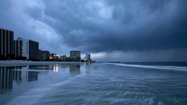 Hurricane-force winds began whipping North Carolina, as federal emergency management officials warned that the Category 2 hurricane, while weakening slightly, remains a “very dangerous storm” capable of wreaking havoc along a wide swathe of the coast. (AFP) Hurricane-force winds began whipping North Carolina, as federal emergency management officials warned that the Category 2 hurricane, while weakening slightly, remains a “very dangerous storm” capable of wreaking havoc along a wide swathe of the coast. (AFP)