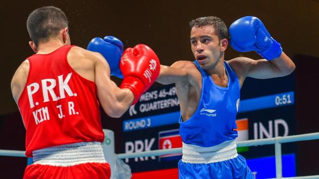 Amit Panghal (in blue), who won the men’s 49kg gold medal at the recently concluded Asian Games in Indonesia, is one of the many boxers to have emerged from Haryana. (PTI) Amit Panghal (in blue), who won the men’s 49kg gold medal at the recently concluded Asian Games in Indonesia, is one of the many boxers to have emerged from Haryana. (PTI)