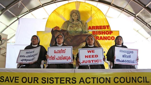 Nuns hold placards during a protest demanding justice after an alleged sexual assault of a nun by a bishop in Kochi, Kerala, September 13, 2018.(Reuters)