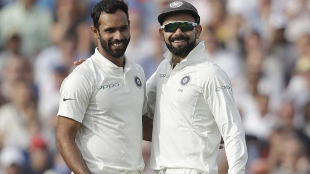 India's Hanuma Vihari, left, celebrates taking the wicket of England's Sam Curran with captain Virat Kohli. (AP) India's Hanuma Vihari, left, celebrates taking the wicket of England's Sam Curran with captain Virat Kohli. (AP)