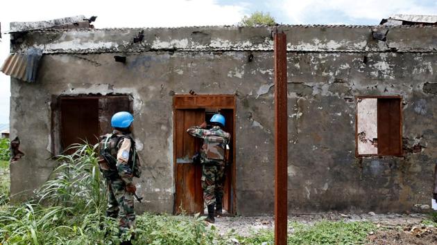 Indian army peacekeepers with UNMISS (UN Mission in South Sudan) look inside a health clinic destroyed by fighting in the village of Wau Shilluk. In total, an estimated quarter of South Sudan’s population of 12 million has been displaced and its economy, which heavily relies on crude oil production, ruined. (Baz Ratner / REUTERS) Indian army peacekeepers with UNMISS (UN Mission in South Sudan) look inside a health clinic destroyed by fighting in the village of Wau Shilluk. In total, an estimated quarter of South Sudan’s population of 12 million has been displaced and its economy, which heavily relies on crude oil production, ruined. (Baz Ratner / REUTERS)