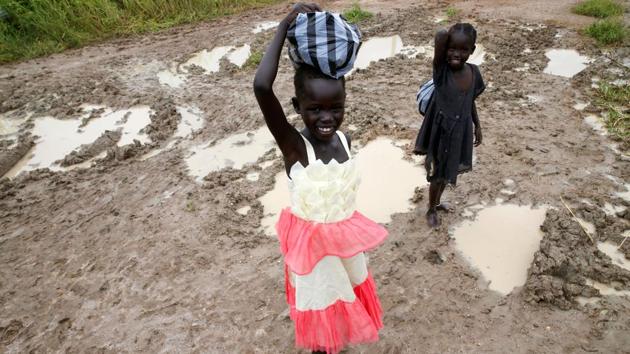 South Sudanese girls walk in Malakal. Peter Aban Amon, minister of information in the Upper Nile region, said he was encouraging people to go back home. “Malakal is well managed by the government, which is now functioning,” he said, adding that the city had already seen a slight population growth over the past two years. (Baz Ratner / REUTERS) South Sudanese girls walk in Malakal. Peter Aban Amon, minister of information in the Upper Nile region, said he was encouraging people to go back home. “Malakal is well managed by the government, which is now functioning,” he said, adding that the city had already seen a slight population growth over the past two years. (Baz Ratner / REUTERS)