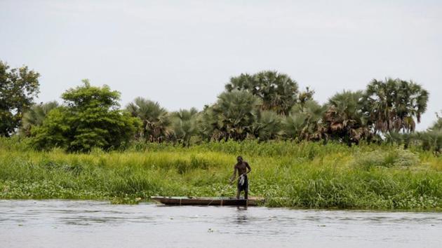 A man fishes on the white Nile near Malakal. The UN camp’s market is bustling while Malakal’s previously busy market is eerily quiet. Fish caught from the Nile are taken directly to the UN market, not the city’s. (Baz Ratner / REUTERS) A man fishes on the white Nile near Malakal. The UN camp’s market is bustling while Malakal’s previously busy market is eerily quiet. Fish caught from the Nile are taken directly to the UN market, not the city’s. (Baz Ratner / REUTERS)