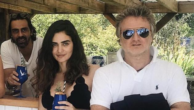 Arjun Rampal (left), Gabriella Demetriades (centre) along with designer Rohit Bal. (HT Photo) Arjun Rampal (left), Gabriella Demetriades (centre) along with designer Rohit Bal. (HT Photo)