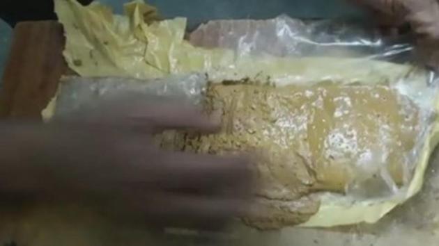 Police recovered gold paste weighing 1269.85gms from the passenger.(ANI Photo)