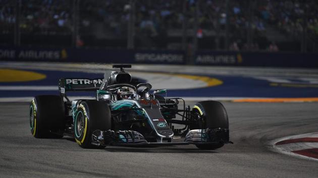 Mercedes' British driver Lewis Hamilton competes during Singapore Formula One Grand Prix at the Marina Bay Street Circuit in Singapore. (AFP) Mercedes' British driver Lewis Hamilton competes during Singapore Formula One Grand Prix at the Marina Bay Street Circuit in Singapore. (AFP)