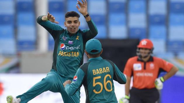 Shadab struck twice in his first over to break the back of Hong Kong (AFP) 