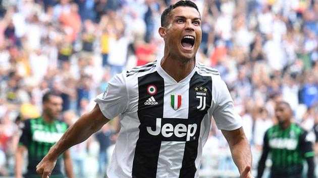 Cristiano Ronaldo celebrates after scoring during Serie A match between Juventus and Sassuolo.(AP)