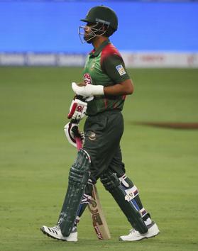 Bangladesh's Tamim Iqbal with his injured left hand covered in an orthopedic cast leaves the field. (AP) Bangladesh's Tamim Iqbal with his injured left hand covered in an orthopedic cast leaves the field. (AP)