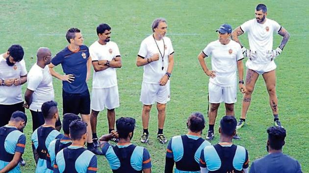 Miguel Portugal (centre) addresses the FC Pune City team during a training session. (HT Photo) Miguel Portugal (centre) addresses the FC Pune City team during a training session. (HT Photo)