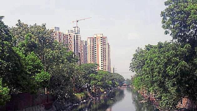 A view of the drain in Sector 1, Ghaziabad. Residents want the drain to be covered and the toxic water to be treated. (HT Photo) A view of the drain in Sector 1, Ghaziabad. Residents want the drain to be covered and the toxic water to be treated. (HT Photo)