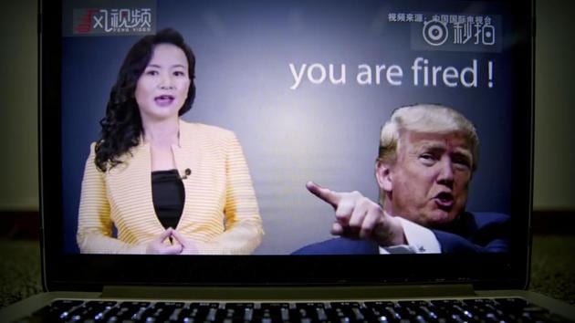 An online video about US-China trade tensions produced by China's state television broadcaster plays in Beijing, August 23(AP)