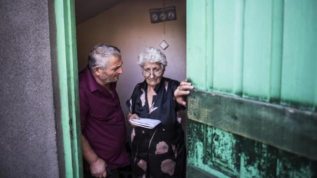 Local residents wait to ride a cable car at a station in Chiatura. As a result of miners complaining, in 1954, when Georgia was part of the Soviet Union, authorities built a network of cable cars leading to the mines and some of the housing developments that crawled up the foothills and slopes. (Evgeniy Maloletka / AP) Local residents wait to ride a cable car at a station in Chiatura. As a result of miners complaining, in 1954, when Georgia was part of the Soviet Union, authorities built a network of cable cars leading to the mines and some of the housing developments that crawled up the foothills and slopes. (Evgeniy Maloletka / AP)