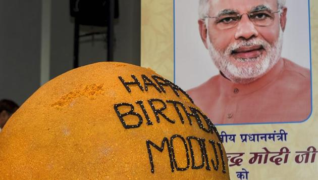 A 568 kg ladoo on display during an event to celebrate Prime Minister Narendra Modi's birthday, in New Delhi. (PTI File Photo) A 568 kg ladoo on display during an event to celebrate Prime Minister Narendra Modi's birthday, in New Delhi. (PTI File Photo)