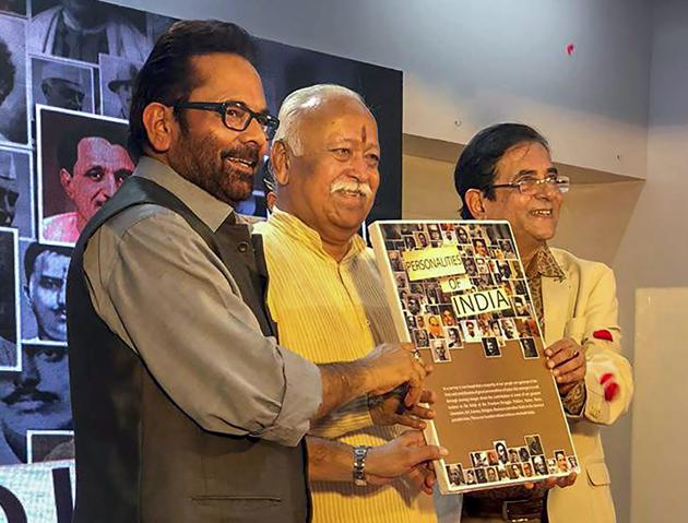 Mohan Bhagwat (centre) and minority affairs minister Mukhtar Abbas Naqvi (left) release a collection of 100 short films 'Personalities of India', based on forgotten personalities, in Mumbai, Sunday. (PTI Photo) Mohan Bhagwat (centre) and minority affairs minister Mukhtar Abbas Naqvi (left) release a collection of 100 short films 'Personalities of India', based on forgotten personalities, in Mumbai, Sunday. (PTI Photo)