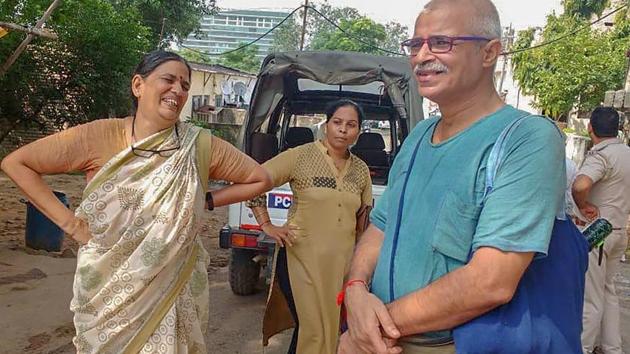 Human rights advocate Sudha Bharadwaj (L) after she was arrested by the Pune police in connection with the Bhima Koregaon violence, in Faridabad. The Supreme Court on Monday extended the house arrest of five rights activists arrested in connection with the Bhima Koregaon violence case till September 19 and fixed the plea by historian Romila Thapar and four others for final hearing on the same day. (PTI File) Human rights advocate Sudha Bharadwaj (L) after she was arrested by the Pune police in connection with the Bhima Koregaon violence, in Faridabad. The Supreme Court on Monday extended the house arrest of five rights activists arrested in connection with the Bhima Koregaon violence case till September 19 and fixed the plea by historian Romila Thapar and four others for final hearing on the same day. (PTI File)
